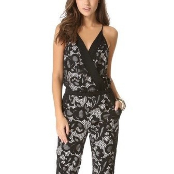 DVF SHANY BLACK LACE JUMPSUIT 6. Bought on Poshmark but it sadly does not fit. - Picture 3 of 12